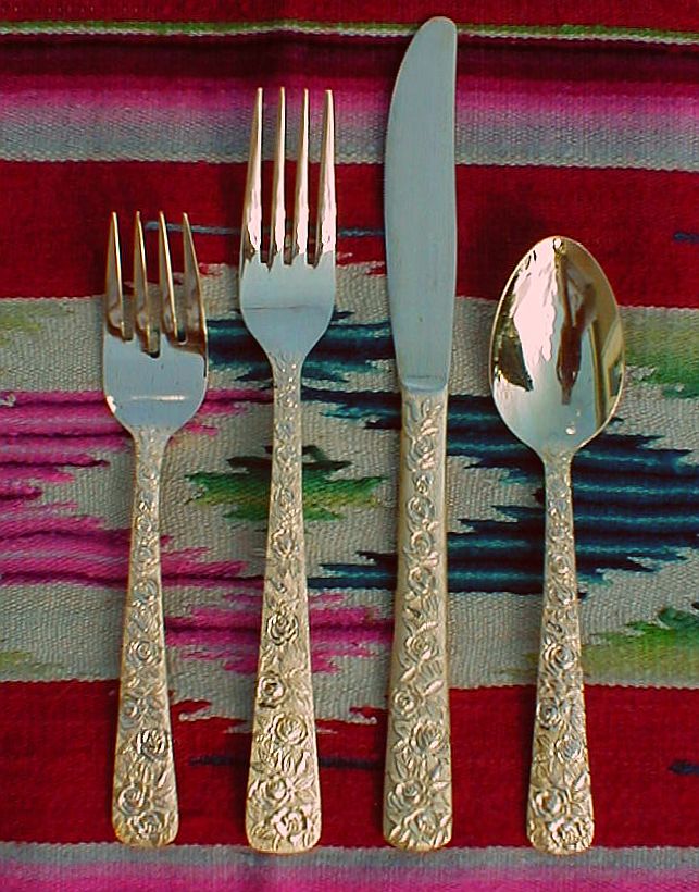 Cellini Romanesque goldplated flatware