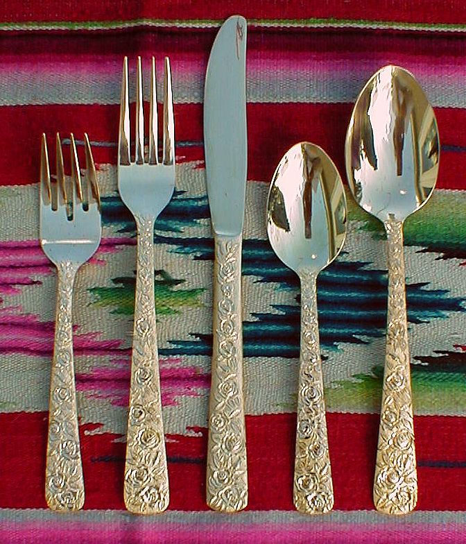 Cellini Romanesque goldplated flatware place setting with soup spoon